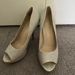 Apr. 9 Silver heel size 8